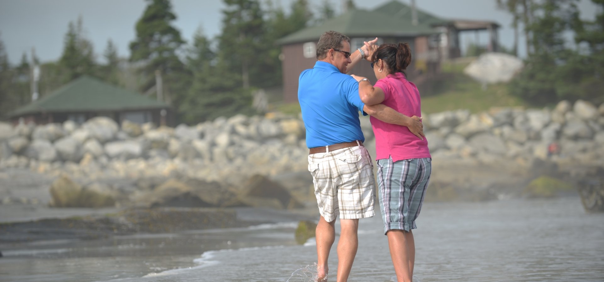 Couple dancing on White Point Beach, romance