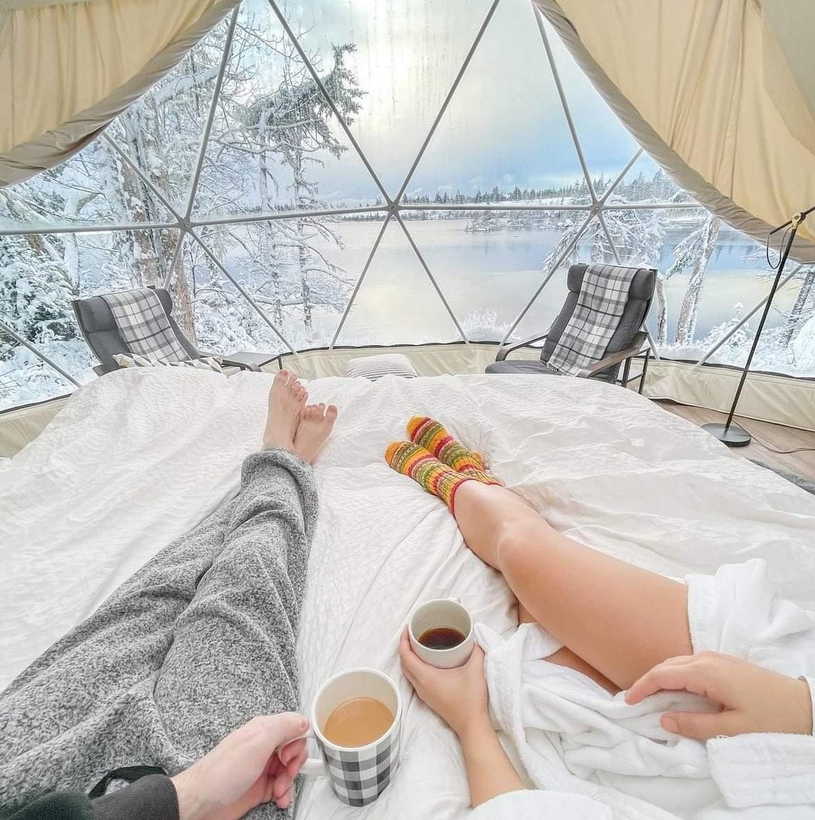 Couple in a Glome during winter at White Point