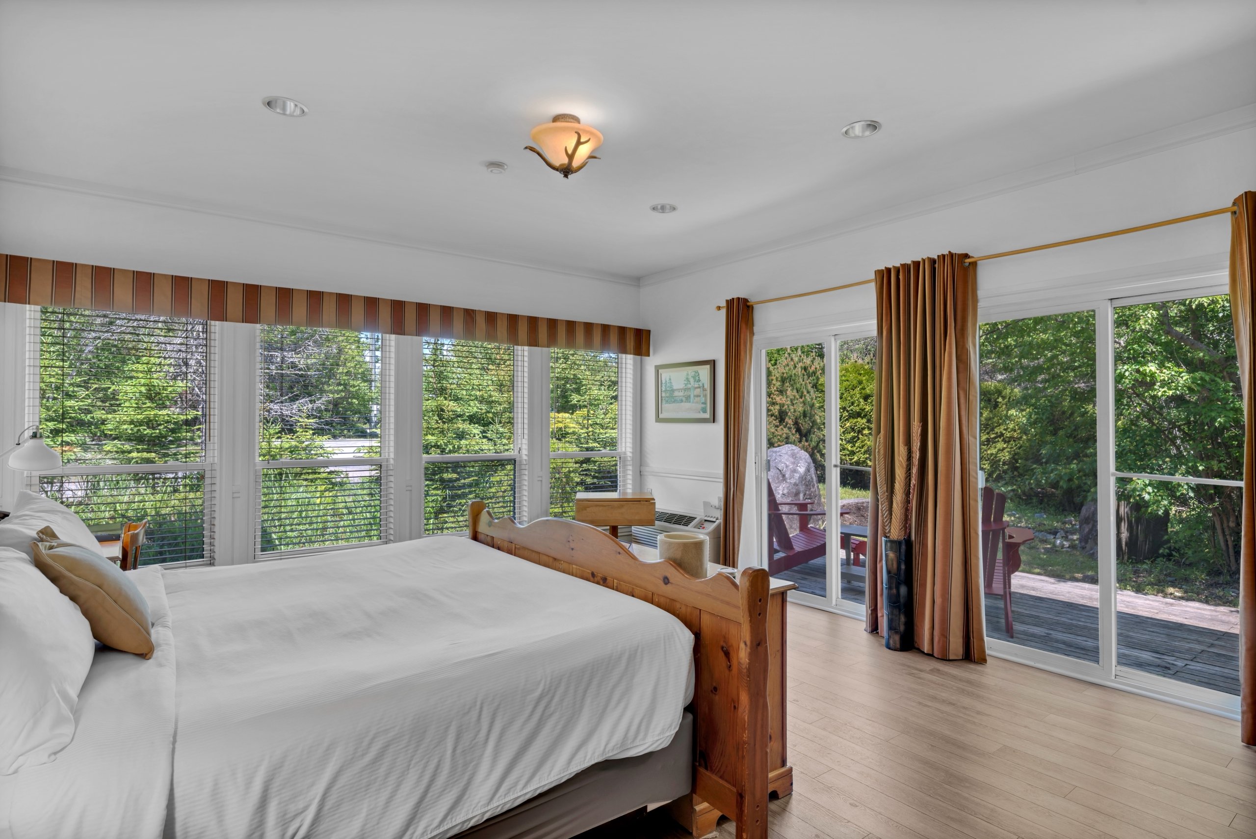 Lakeside Retreat King Room Bed View Summer 2025