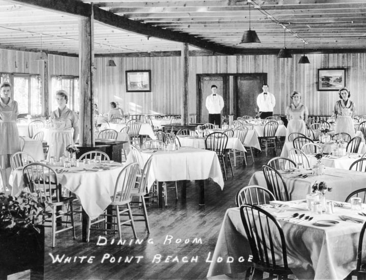 an old photo of the dining room at White Point Beach Resort