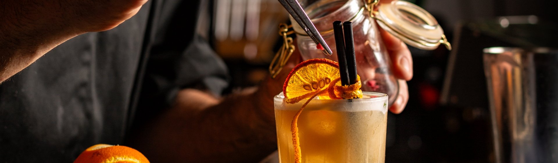 Preparing Smoky Spiced Orange Cocktail