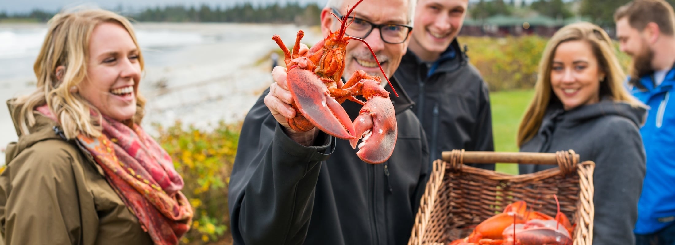 Group of people enjoying a lobster boil