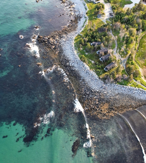 aerial view of White Point Beach Resort and the surrounding ocean