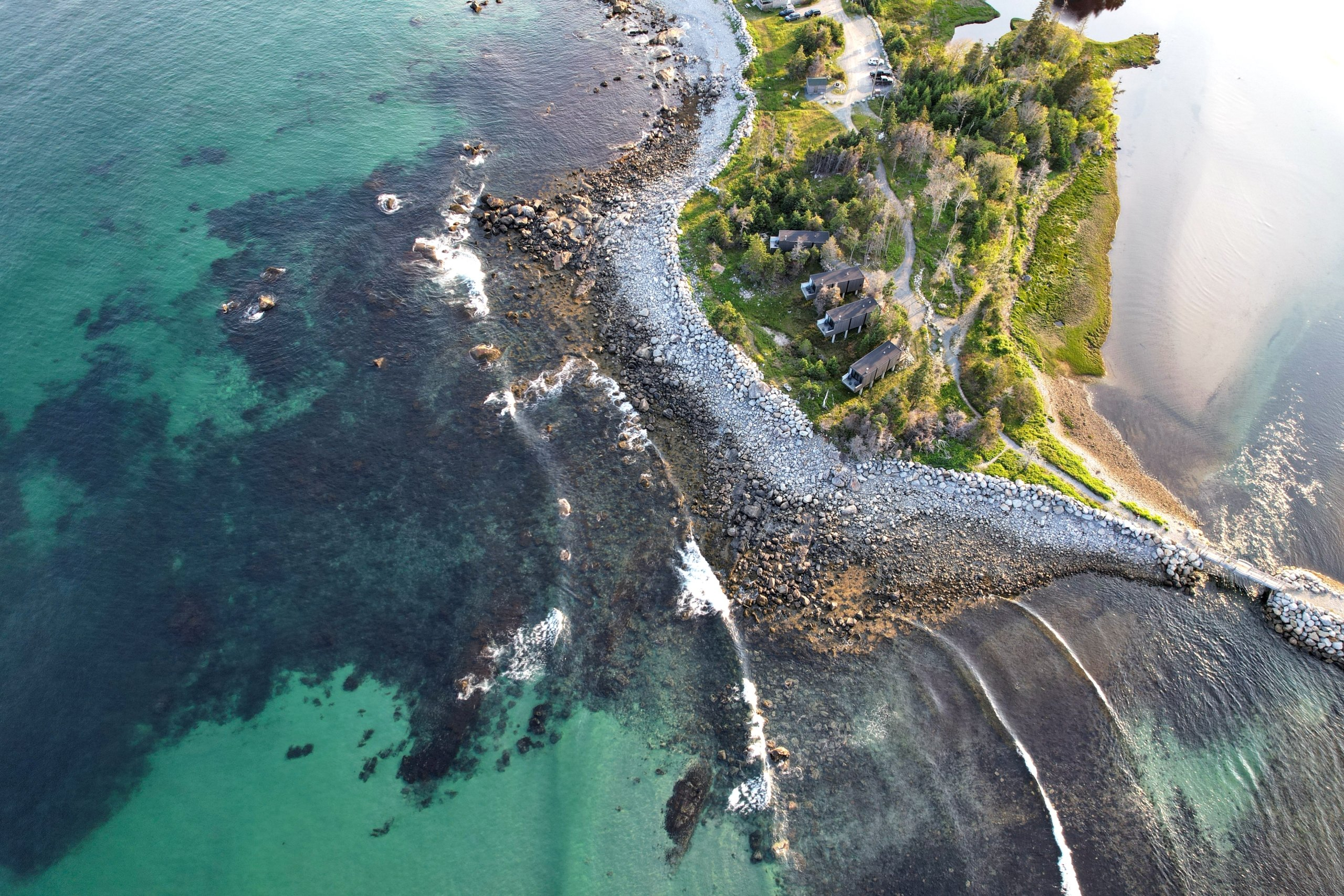 aerial view of White Point Beach Resort and the surrounding ocean