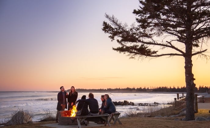 Group of people having a bonfire