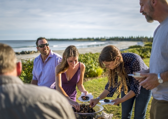 Group of people enjoying mussels