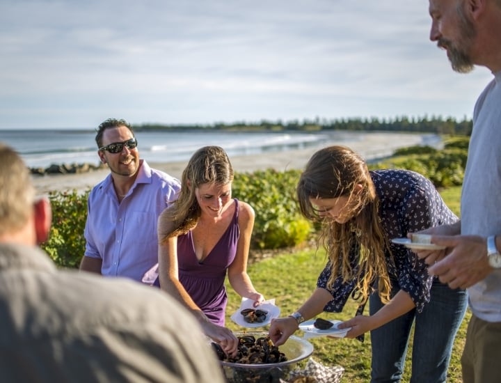 Group of people enjoying mussels
