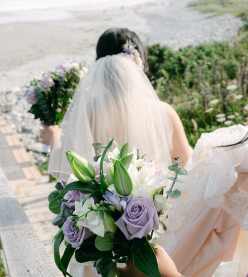 Bride Walking Towards the Beach